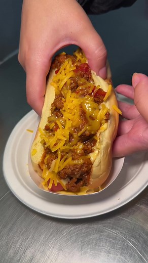 The CHEESY SLOPPY DOG! 🧀🌭🔥 Classic Grilled Dog topped w/ Sloppy Joe, House Cheese Sauce & Cheddar Cheese! 😎💥 #nyc #hotdog #cheese #cheesy #chili #newyorkcity #food #foodie #5boroughfoodie #fyp