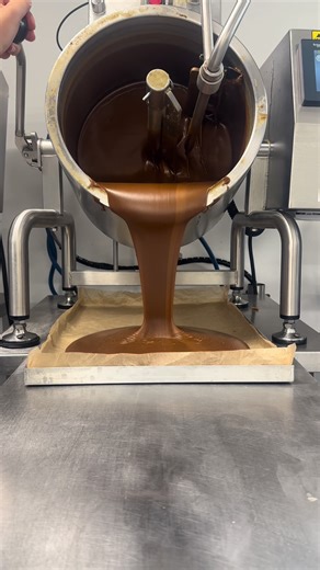 From our kitchen to your doorstep — shop the magic now 🍬 Here we have Kelsey pouring our butterscotch fudge which will set for 24 hours before it goes into our cutting and decorating stage. Our butterscotch fudge is available has sliders.. Head to the fudge kitchen website.. link in bio✨ #fudgekitchen #fudge #fudgegoals #butterscotch #pouring