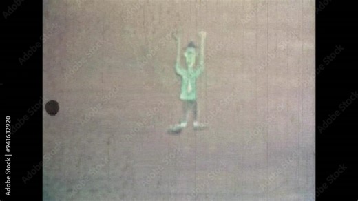 Archival vintage film, drawn cartoon man character moving funny, dances. Archival stop motion movie. Vintage black white. Animated bygone archive. Retro 1960s cartoons. Old-fashioned comic characters