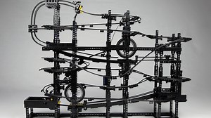 Complicated LEGO Machine Continually Accelerates Small Balls Through a Roller Coaster at 1,000 RPM