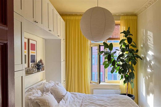 This Historic Oslo Apartment Has a Remarkably Narrow but Incredibly Cozy Bedroom