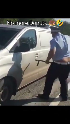 Cop tries to smash window but fails 🤣 #2026 #2027 #viralsong #viralmusic #police