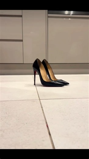 Trying on Christian Louboutin So Kate high heels
