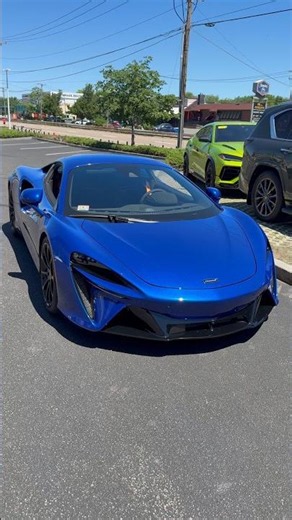 McLaren Monday. Gorgeous Blue McLaren Artura sparkles in the sun.