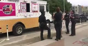 Former Detroit officer parks ice cream truck near store that turned police away