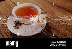 Waveform appearing from left, traveling across frame, undulating over polka cup, visualizing audio. Teacup, saucer, rustic, woodgrain, overlay, amber, anise Stock Video Footage - Alamy