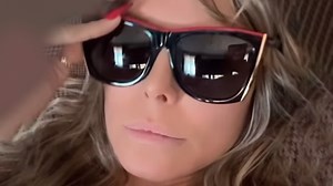 Heidi Klum goes pantless and rocks bizarre costume and heels on football field