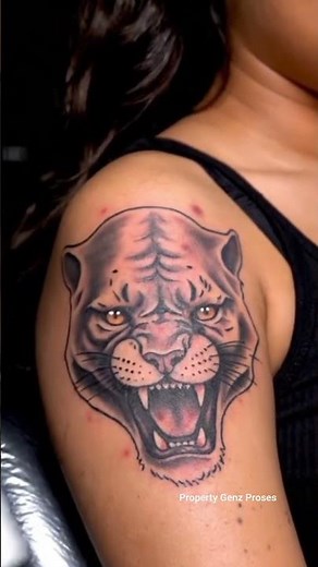 Inside the Tattoo Factory: The Process of Making a Black Panther Tattoo on a Woman's Arm