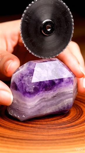 Nazima Agate on Instagram: "POV: You just watched a purple crystal get sliced like glass and your brain said… again. 😮‍💨💜 This is Purple Lepidolite in a beryl-crystal shape — and that mirror-clean diamond saw cut is pure luxury ASMR. 🔪✨ Listen closely: • the high-frequency hiss • the smooth glide • the final clink split It’s the kind of satisfying that replays itself. If you felt calmer in 7 seconds… that’s your sign. 💫 Comment “PURPLE” and I’ll drop the next rare cut. Save this for later +