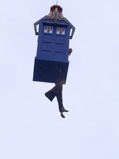 The TARDIS is being lifted by a helicopter! #doctorwho