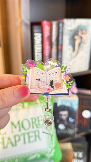 Her Crescent & Co • nurse inspired shop on Instagram: "our book badges are back 🥹📖✨🗡️💕 AHHHH!!! I’m so excited to have these restocking in the shop after they sold out SO quickly!! These have been such a treasure to me & I’m so happy y’all love them so much 🥹!!! 🩷RESTOCK DETAILS🩷 *please note: these will be restocking at different times for both of our shops- dates below!!! ✨Restocking in the HER CRESCENT & CO shop on Jan 12th @ 6pm EST! ✨Restocking in the SKYE & OLIVER shop on Jan 17 @ 9