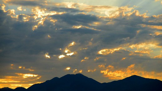 Beautiful sunset over the mountains - Free Stock Video