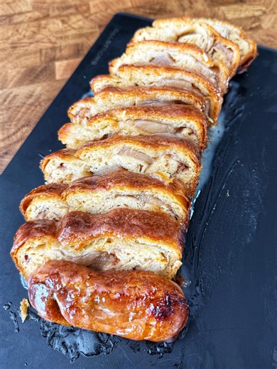 This Cinnamon Apple Bread is the perfect Fall treat! CJ is combining butter cresent rolls, with cinnamon rolls and apple pie filling to make this amazing cinnamon apple bread! What is your favorite fall treat? Ingredients: -Package of cresent rolls. -3 to 4 uncooked cinnamon rolls. -Apple pie filling. -3 to 4oz butter. -1 tbsp cinnamon suger mix. Prep: Roll out the cresent rolls in one sheet. Pressing the perfortions together. Unroll the cinnamon roll and place on the cresesnt roll sheet. Add 3