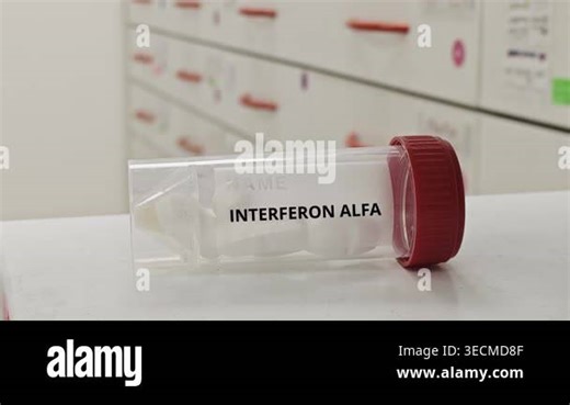 INTERFERON ALFA tablets used to modulate immune response in viral infections and cancer Stock Video Footage - Alamy