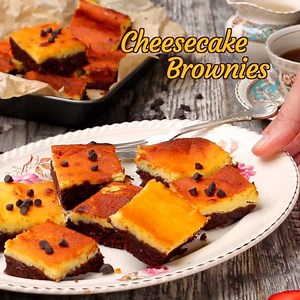 293K views · 644 reactions | Do you want fudgy brownies or rich cheesecake? We weren’t sure so we baked the best Cheesecake Brownies to satisfy both cravings. Now whether you want to surprise your dessert loving family or make something super-tasty to treat yourself, our Cheesecake Brownie recipe is the best you can bake. | Yummefy | Facebook