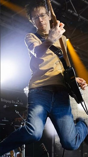 Live on stage at a festival it's BRITPOP REUNION (90's tribute band)