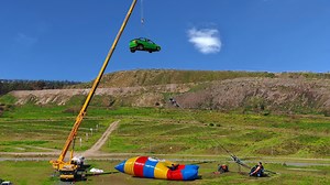 Watch what happens when a car is dropped from 150 ft
