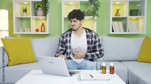 The man with an upset stomach gets up to vomit.