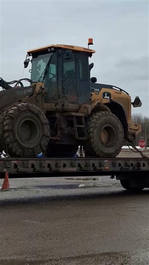Nice truck hauling a front end loader.......#shorts #trucking