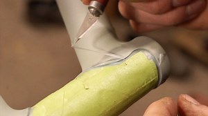 Masking lugs with a liquid frisket. It’s just the way I’ve done it for so long. Some people hate it, I love it. Apply frisket, let dry overnight, rough mask with tape, cut the edge, spray base coat, remove everything, and make sure no remnants are left in the crevice before moving on to the clear coat. #bicyclepainting #maskingtape #frisket #chapmancycles | Chapman Cycles