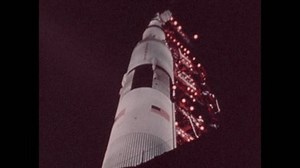 clip-1099831465-1970srocket-on-launch-pad-workers-prepare-lift