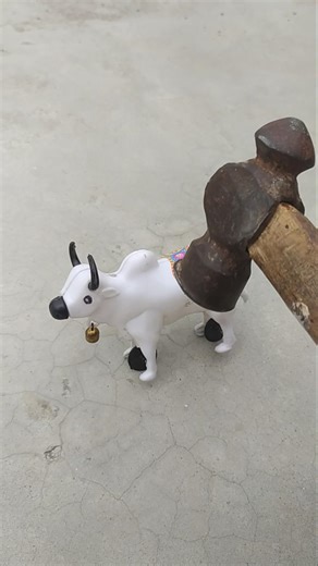 Remote control bull toy vs hammer