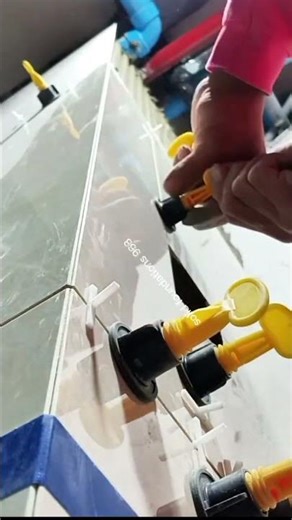 The correct method of laying tiles on a kitchen slab.#ytshorts #tileswork #shortvideo #ytshorts #yt