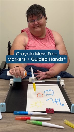ImaginAble Solutions | Guided Hands on Instagram: "Creativity without limits (and without the mess!) Guided Hands® is an assistive device that helps people with limited hand mobility write, draw, paint, and access technology with ease. Paired with Crayola Mess Free Markers, it opens the door for accessible art that’s fun, vibrant, and completely mess-free. Want to see how Guided Hands® can make a difference? Join our upcoming webinar — link in bio! . . #AccessibleArt #AssistiveTech #GuidedHands 