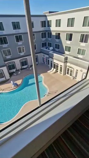 Swimming Pool at Country Inn Suites by Radisson, Port Canaveral, Florida #hotels #americanhotels #radissonhotel #radisson #capecanaveral #countryinnandsuites #hotel #placestostayflorida #placestostay #travel #florida #hotel pool #swimmingpool #portcanaveral #portcanaveralflorida