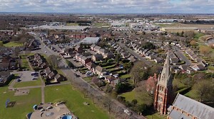 Drone flight over power station infrastructure generating electricity