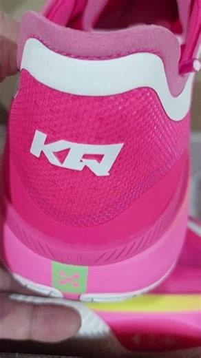 The Adizero Select 3.0 “KQ63” comes in a bright neon pink upper contrasted by the white stripes