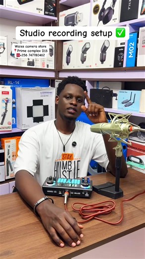 Studio recording setup: A studio recording setup consists of a microphone connected to an audio interface, which sends sound into a computer running recording software (DAW). The setup typically includes headphones or studio monitors for playback, basic acoustic treatment to reduce echo, and accessories like a mic stand and pop filter to ensure clean, professional audio capture. #walescameracentreug #studiosetup #viral #tiktokuganda🇺🇬🇺🇬🇺🇬 #xycba