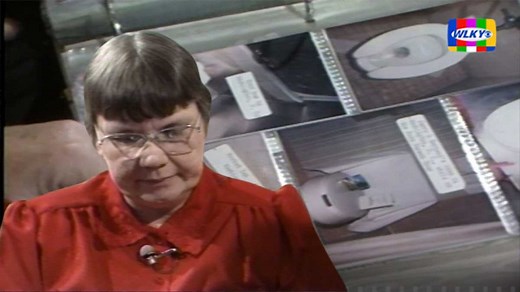 'Commode Lady' shows WLKY her large, international collection of toilet photos in 1991