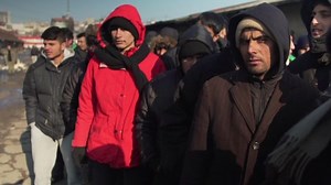 Migrants endure freezing conditions in Serbia