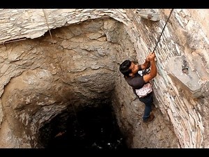 Drowning puppy's amazing rescue from well. Please share!