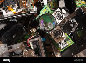 Component parts of a broken high resolution 3 chip digital video camera with circuit board lens vga Stock Photo - Alamy