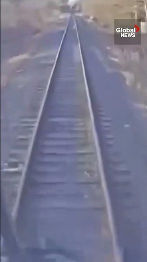 MOMENT: GO Train crashes into dump truck on railway tracks