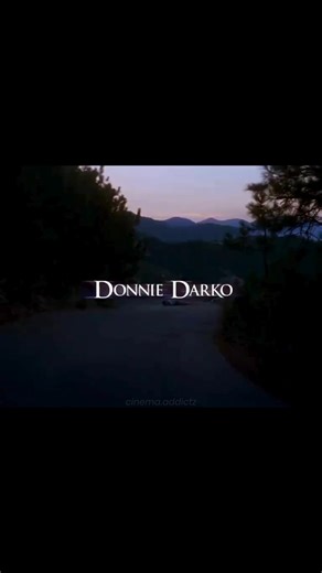 Cinema Addictz on Instagram: "Free movie site in bio🔗 Donnie Darko merges suburban normalcy with psychological disquiet, creating a narrative that feels simultaneously intimate and otherworldly. The film follows a teenager whose visions fracture his sense of reality, drawing him into questions of fate, choice, and responsibility. Rather than offering clear explanations, the story allows ambiguity to dominate, transforming familiar environments into spaces of quiet unease. The film’s emotional w
