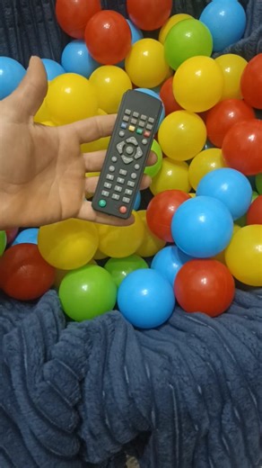 A television remote control came out of the colorful balls.