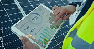 Solar panels, hands and technology screen or tablet for data analysis of eco friendly heating, power and energy saving stats. Engineering person on digital app, photovoltaic grid and graphs or charts