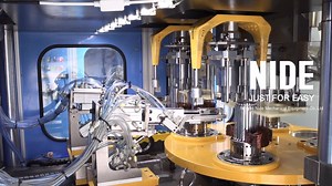 NIDE full Automatic Stator Coil Winding Machine.This machine has four winding stations. High efficiency is its feature. The machine automatically put the coil into transfer former orderly, auto cutting and auto indexing could be completed at a time successively！ | Nide Group