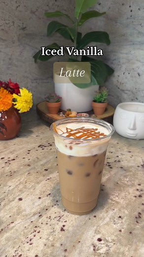 Replying to @Stays an Iced Vanilla Latte 🤍 Ingredients: Ice Oatmilk Torani sugar free vanilla syrup Instant coffee dissolved with hot water OR double espresso shot in Ice Leggero Heavy whipping cream Sugar free caramel drizzle Instructions: 1. Ice in cup 2. Milk in cup 3. Vanilla syrup in cup 4. Coffee in cup 5. Cold foam (heavy whipping cream vanilla syrup) 6. Caramel drizzle #icedcoffee #icedlatte #cafehelado #cafefrio #icedvanillalatte #vanillaicedlatte #nespresso #nespressovertuo #nespresso