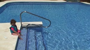 clip-99784-young-toddler-girl-uv-suit-floatation-jacket