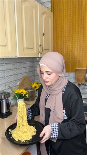 ‎ام سيف‎ on Instagram‎: "تجربة الاندومي الطائر😂😂ام سيف ونانو"‎