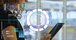 Woman tapping tablet and activating radial HUD, adjusting specs while inspecting map for analysis