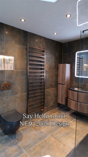 TBCG | Luxury Bathrooms Glasgow on Instagram: "Step into the future of bathroom design with our brand new TBCG 2025/2026 Display Bay! ​We’ve paired deep textures with warm, brushed bronze accents to create the ultimate modern sanctuary. From the fluted wood textures to the sleek, minimalist brassware, every detail has been curated for a premium experience. ​Featured in this display: ​Shower Tray & Wetroom Screen: KB Bathrooms & @flairshowers ​Vanity, Glass Basin & Wall Units: @wood_stock_trading