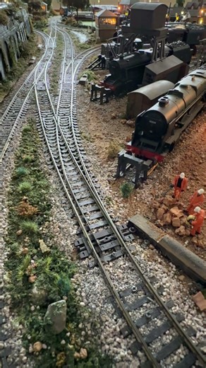 British Rail Class 121 "Bubble Car" number 55027 passes over a Peco Streamlined points crossover.