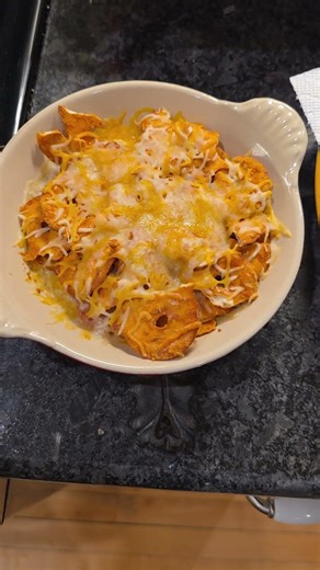 Late night snack of nachos made of flat pretzels & shredded cheese topped with bacon #snacksrecipe