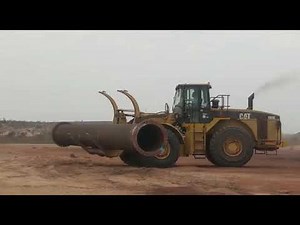 Cat 980G Wheel Loader Pipe Handling with Fork attachment