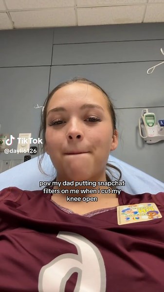 Supportive Dad Using Snapchat Filters After Injury
